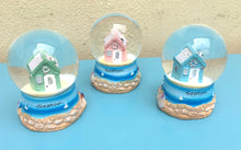 Seaton Beach Hut & Crab Snow Globes